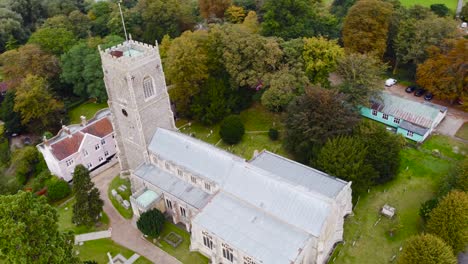 aerial: st michael's church compound in framlingham, england - drone tracking shot