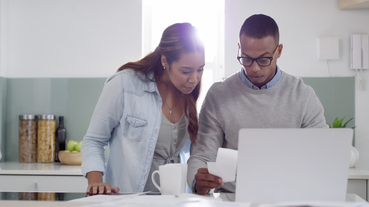 Couple Paying Bills at Home