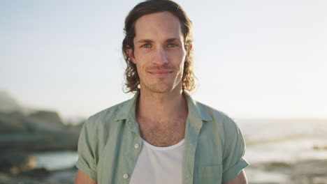 happy, smile and face of man at beach for travel