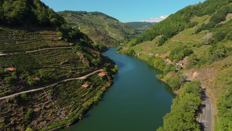 aerial view of minho river between the mountains in lugo, spain