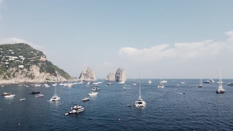 flying over the crystal waters of capri in italy.