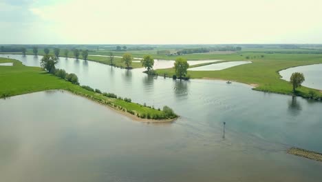 aerial drone view of the big river in the netherlands, europe