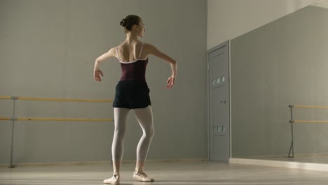 ballet dancer practicing in studio