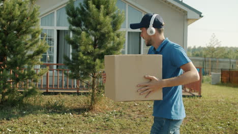 delivery person carrying a package