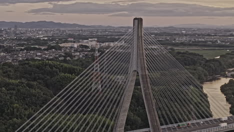 toyota japan aerial v6 zoomed drone flyover doaicho and around the arrows bridge captures the winding yahagi river and the togaricho cityscape at sunset - shot with mavic 3 pro cine - oct 10th 2023