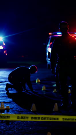 police at a nighttime crime scene