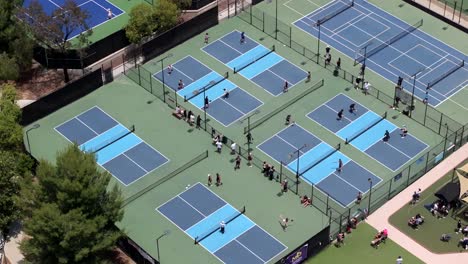 pickleball tournament play at a sports club complex - aerial parallax
