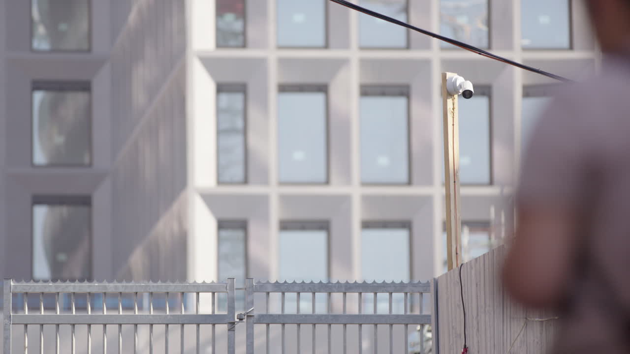CCTV camera at entrance gate to New Government quarter construction site in Oslo