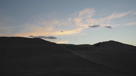 beautiful view from a car of a vivid sunset in the little sahara desert in central utah