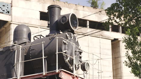 antique kukushka train display on sunny day in borjomi-bakuriani, georgia