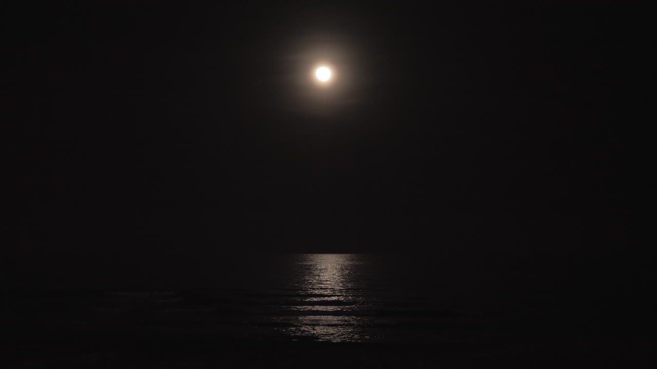 Moon and sea at dark night