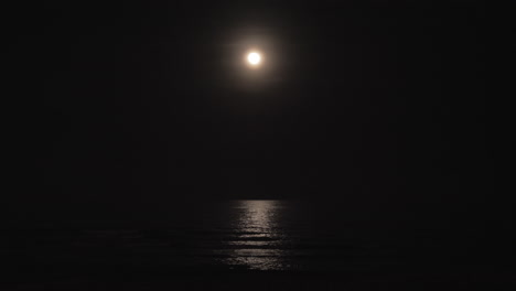 moon and sea at dark night