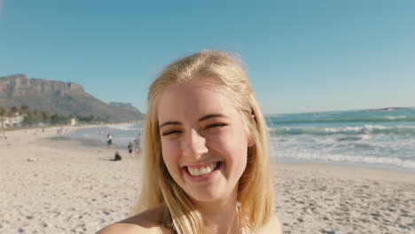 happy woman having video chat on beach girl blowing kiss at camera sharing summer vacation using smartphone showing travel adventure having fun holiday experience