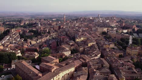 drone orbit of the italian city, siena