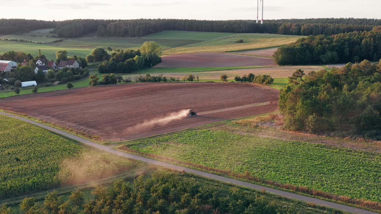 Orbiting around farm tractor at golden hour, 4k