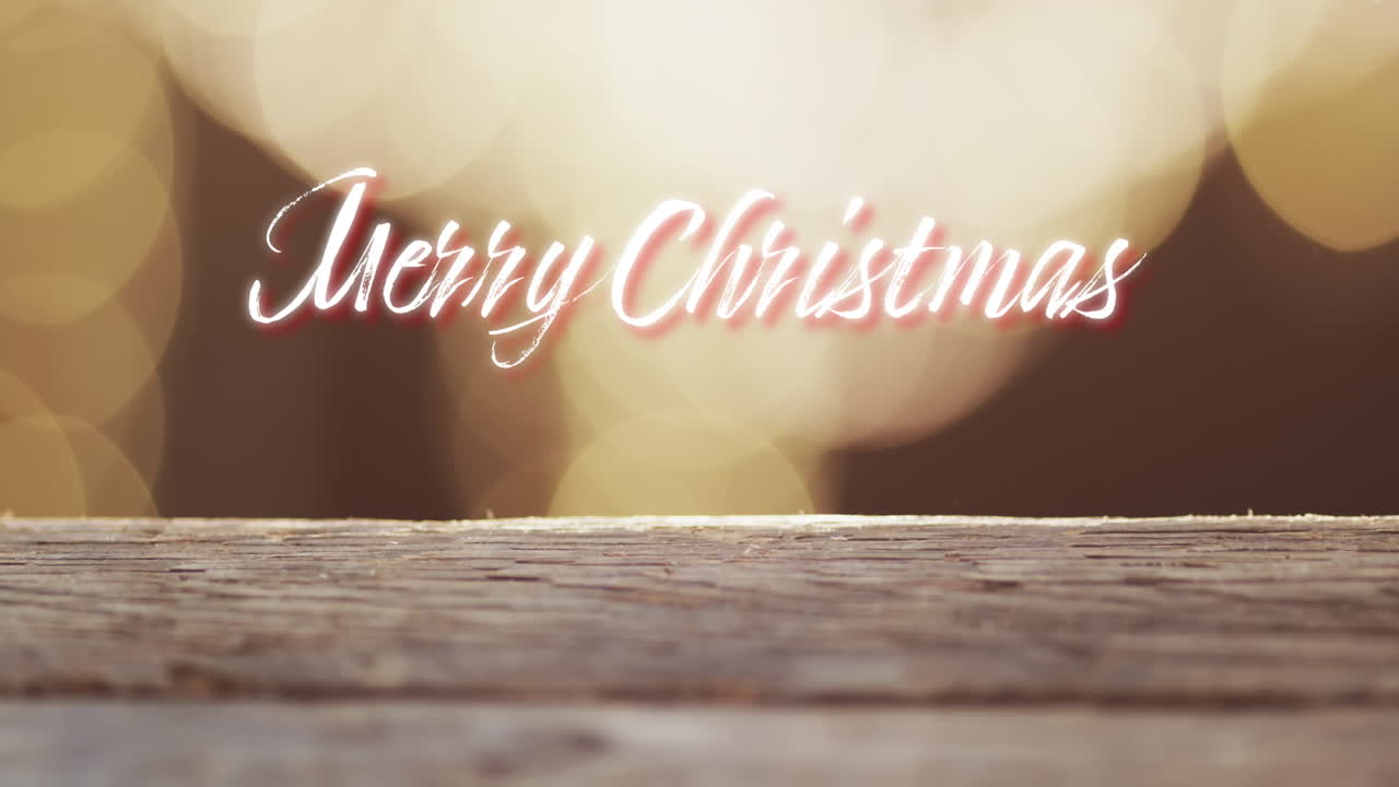 밝은 배경의 노란색 반점 위에 메리 크리스마스 텍스트의 애니메이션
