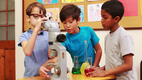 pupils doing science together in class