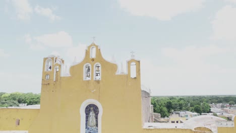 a cross in the church of izamal drone aerial view