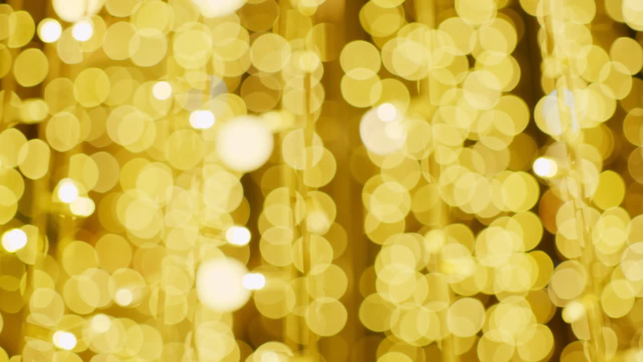 추상적인 황금색 보케 (bokeh) 의 멋진 장식적인 빛의 배경