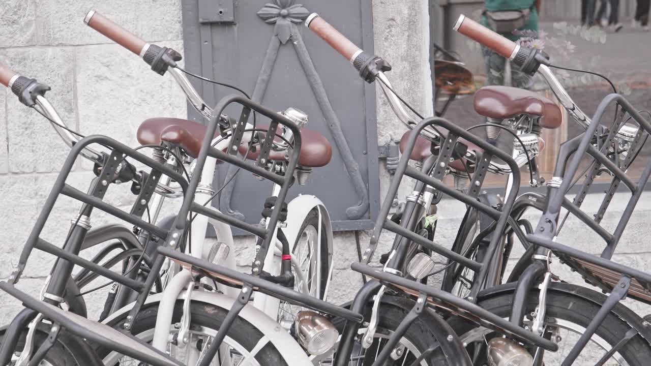 Public commuter electric bikes at urban city rental station