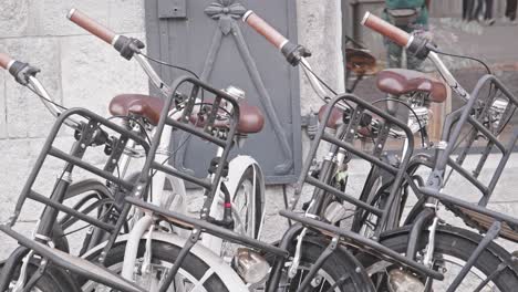 public commuter electric bikes at urban city rental station