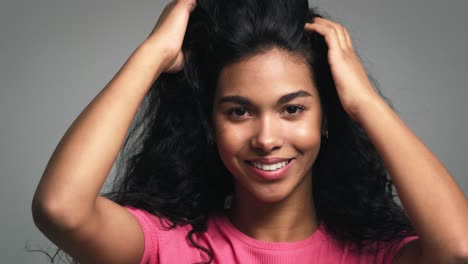 close up of young african woman with long beautiful hair