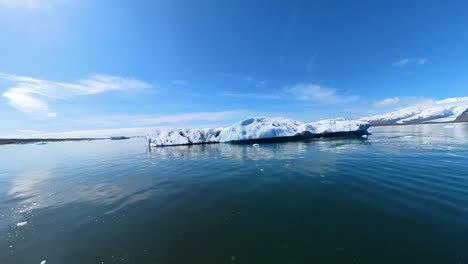 jökulsárlón glacier lagoon the breathtaking beauty of iceland, where majestic icebergs drift lazily under the radiant sun in the clear blue sky