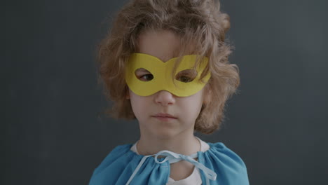 child dressed as superhero