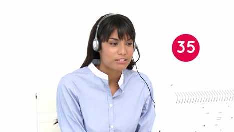 Animation-of-numbers-over-biracial-businesswoman-using-phone-headset