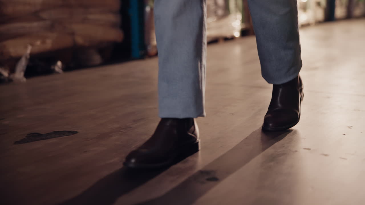 Person walking in a warehouse