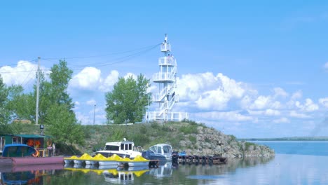 lakefront observation tower and boats