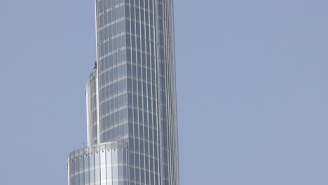 zooming in on burj khalifa's upper structure