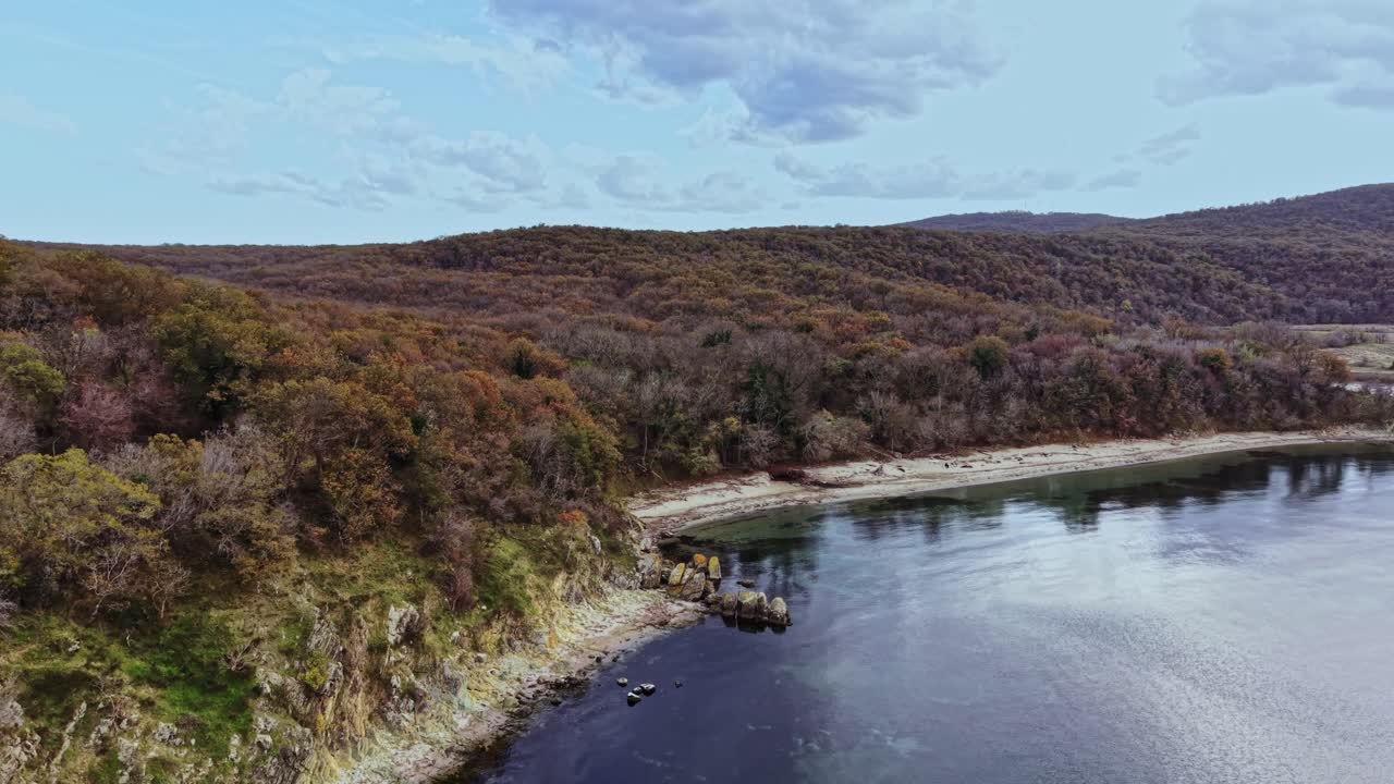 Scenic aerial view of a tranquil coastal landscape during autumn