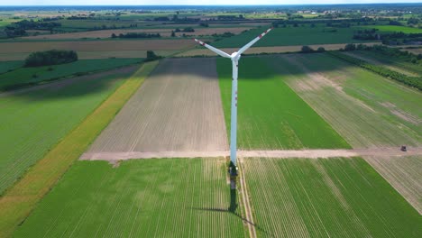 panoramic view of wind farm or wind park, with high wind turbines for generation electricity with copy space