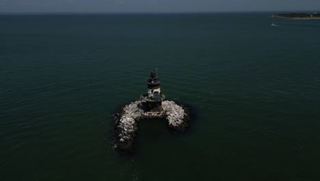 an aerial view the orient point lighthouse off the east end of orient point, ny on a sunny day