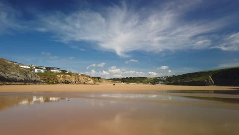 Mawgan-Porth-Beach,-Cornwall---looking-towards-the-dunes-and-hamlet