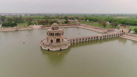 aerial flyover of famous lake at hiran minar, tourist destination in pakistan