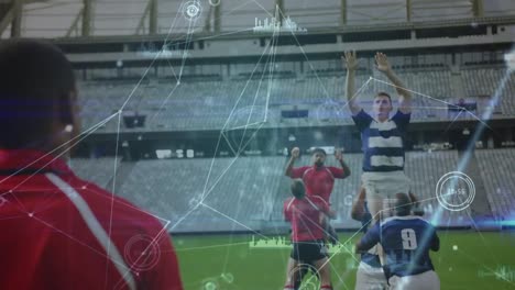 Animation-of-network-of-connections-over-team-of-diverse-male-rugby-players-playing-rugby
