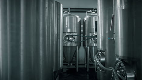 inside a brewery - stainless steel tanks