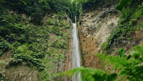 slow motion close up shot of ribeira quente natural waterfall in sao miguel in the azores - portugal