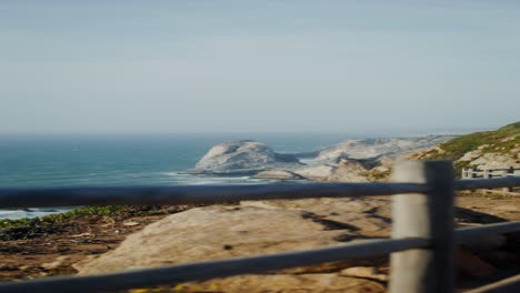 coastal view with wooden fence at cabo da roca, portugal