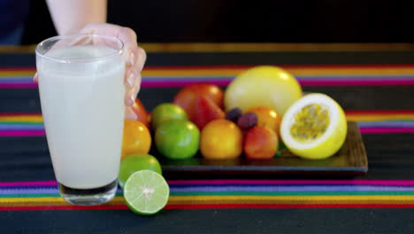 fresh fruits and a glass of lemonade