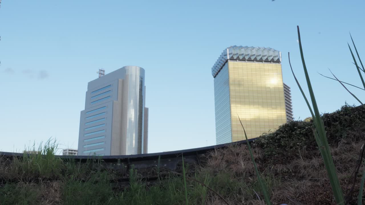 The Sumida Ward Office and Asahi Beer Hall stand along the Sumida River, showcasing modern Tokyo landmarks