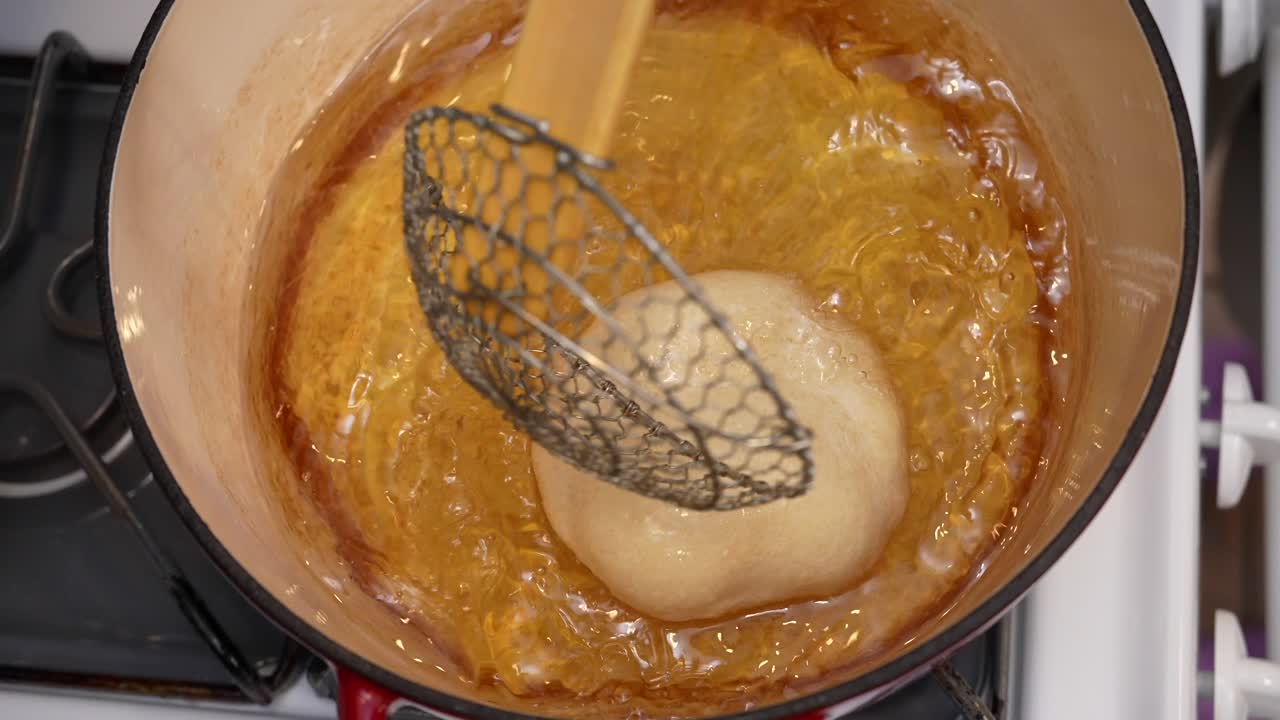 Top down view of frying dough for bhatura Indian bread - Chana Masala series