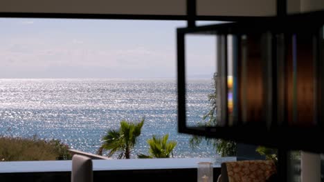 Slow-motion-revealing-shot-of-a-beautiful-sea-view-from-a-villa-in-Sete,-France