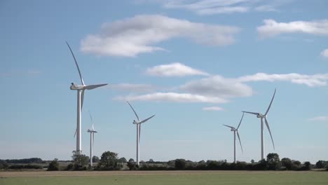 wind turbines turning in strong winds