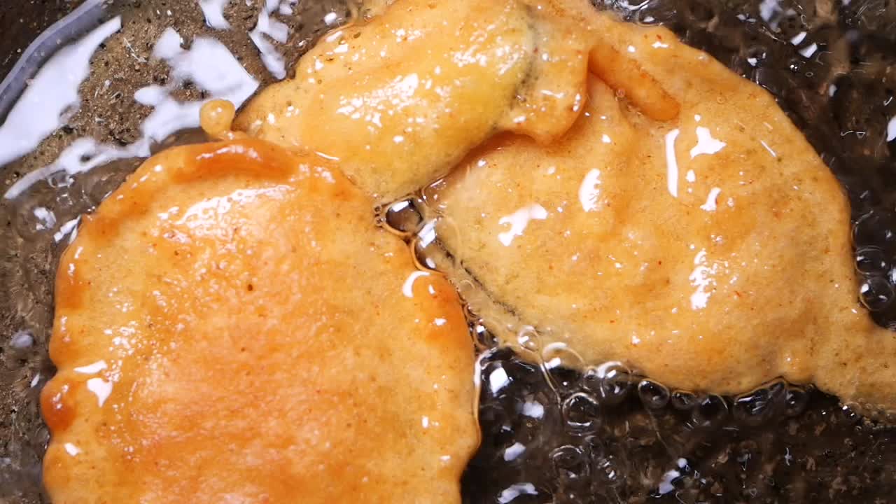Frying fritters in oil