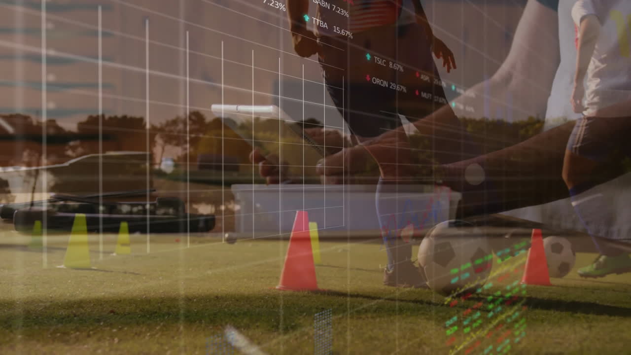 On grassy field, animation overlaying stock market data during soccer training