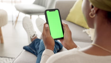 Mockup,-phone-and-green-screen-by-woman-on-sofa