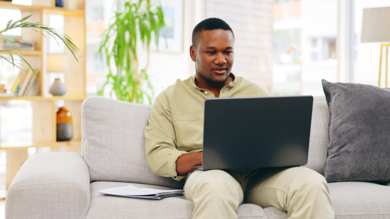 Documents, black man and laptop for remote work